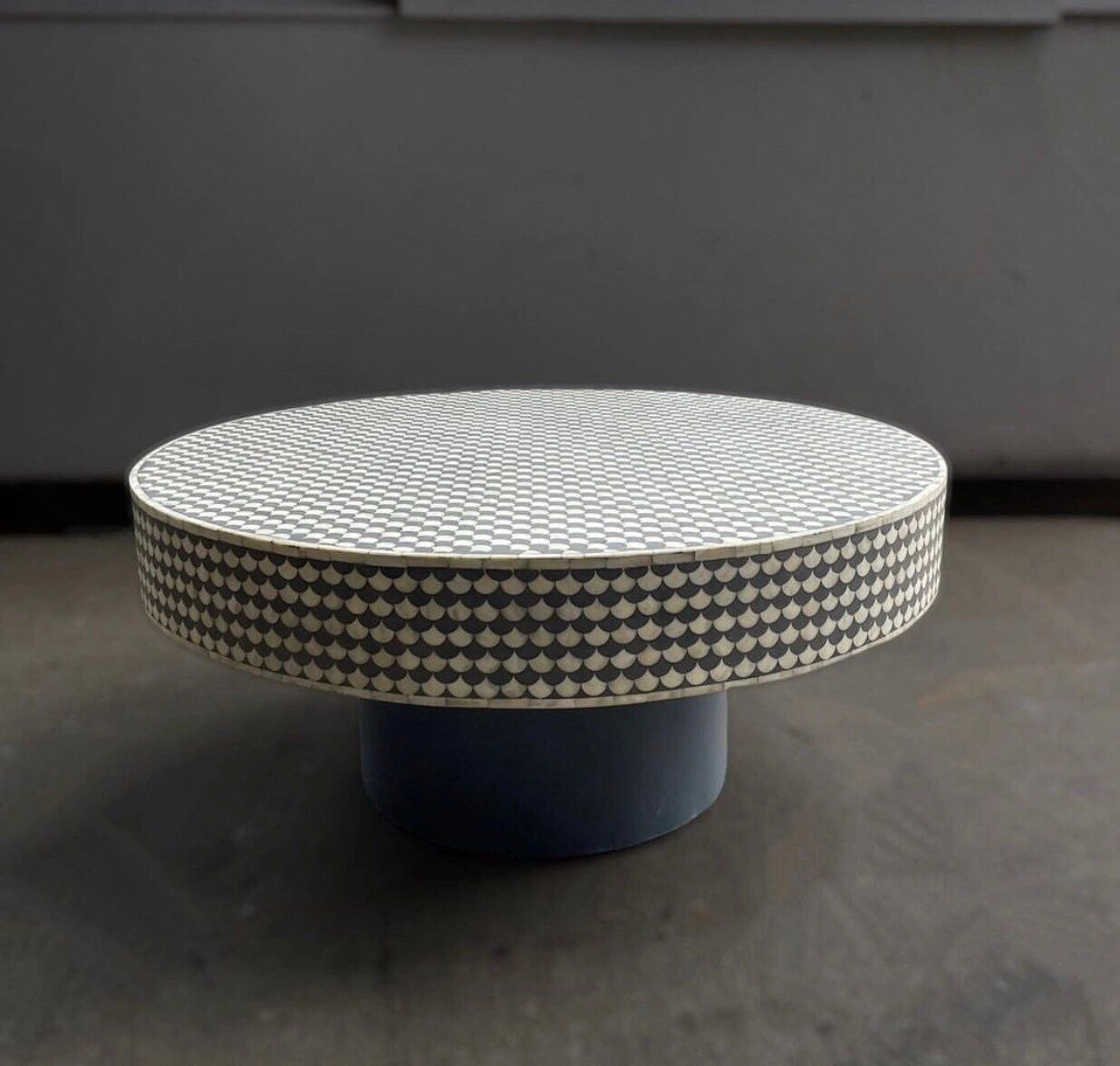 Heritage inlay pattern on wooden round coffee table
