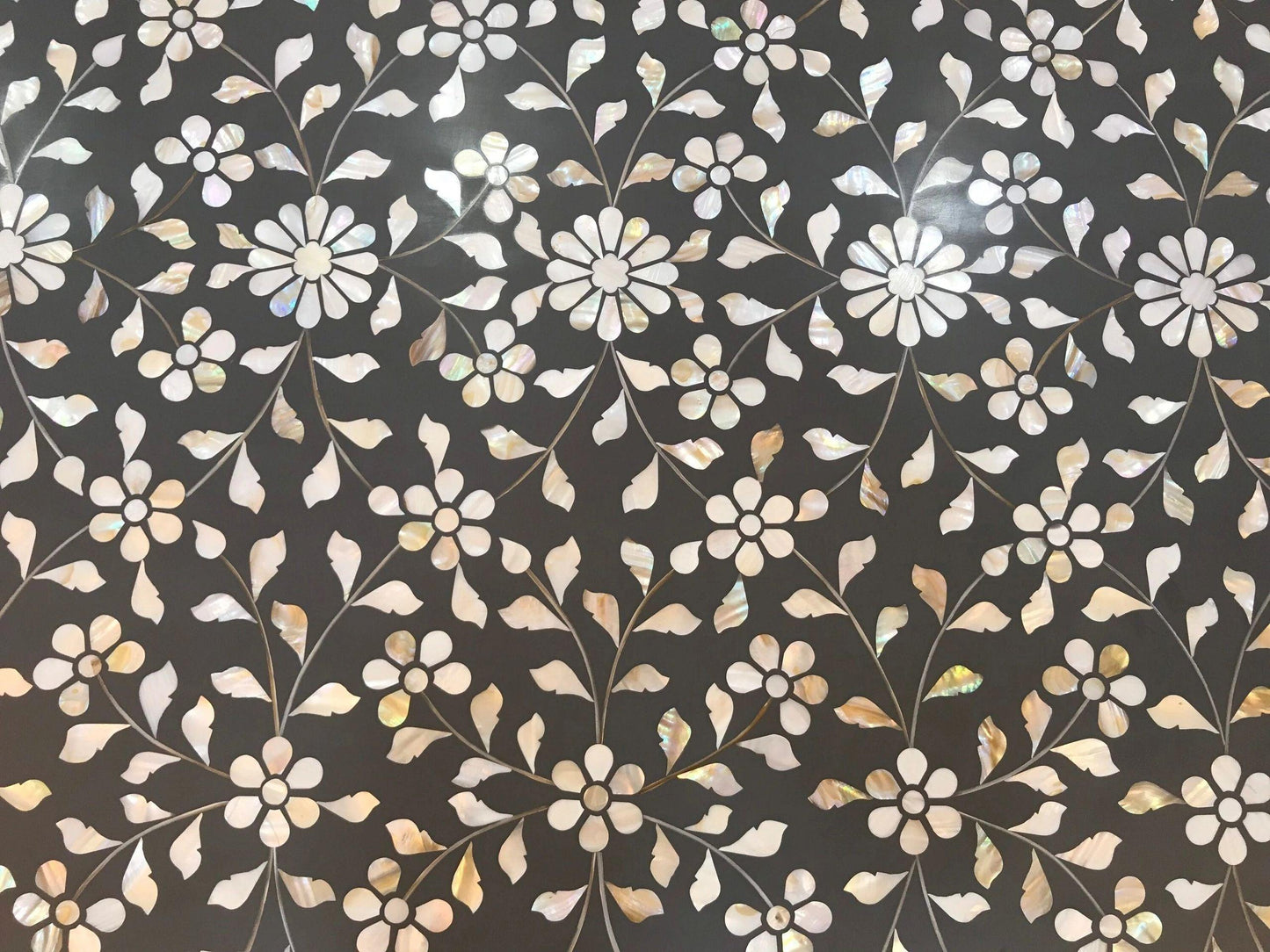 Mother of pearl inlay floral pattern with brass metal base on wooden coffee table