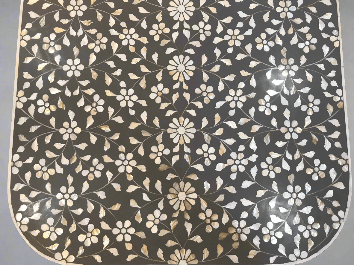 Mother of pearl inlay floral pattern with brass metal base on wooden coffee table