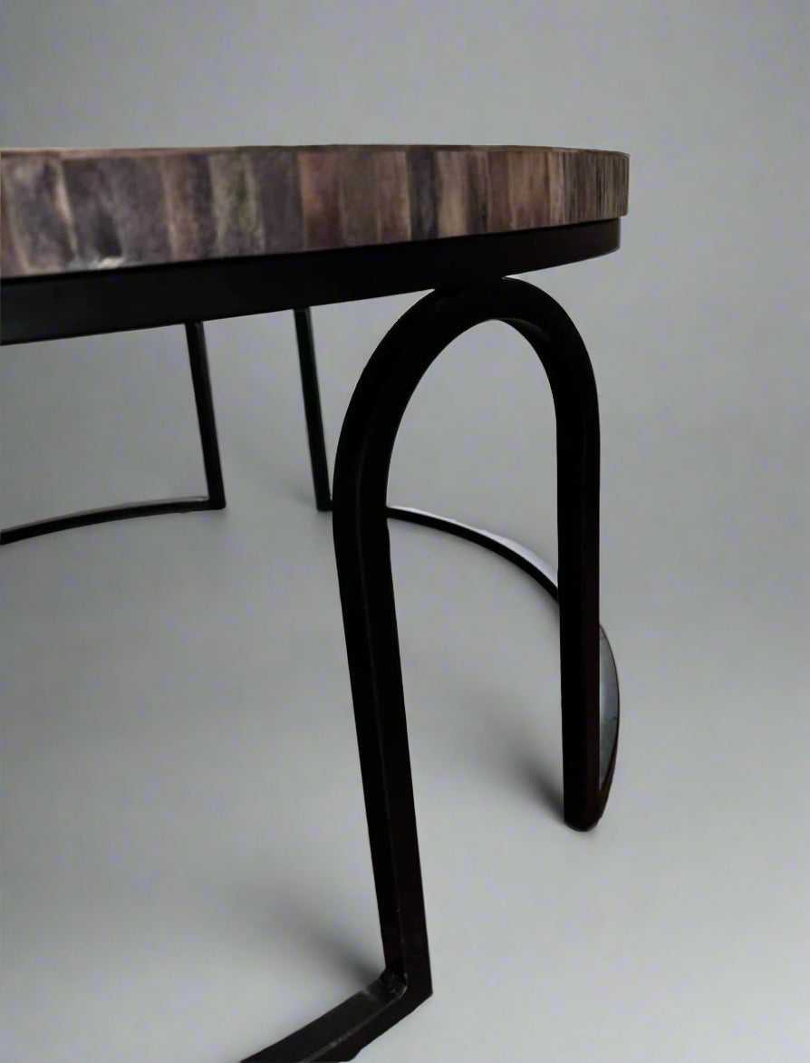 Vintage charm chevron coffee table with wooden inlay top and slender metal frame, showcasing elegant design details.