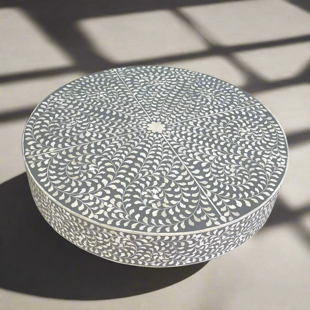   Heritage inlay floral pattern with brass base on wooden coffee table for the living room.